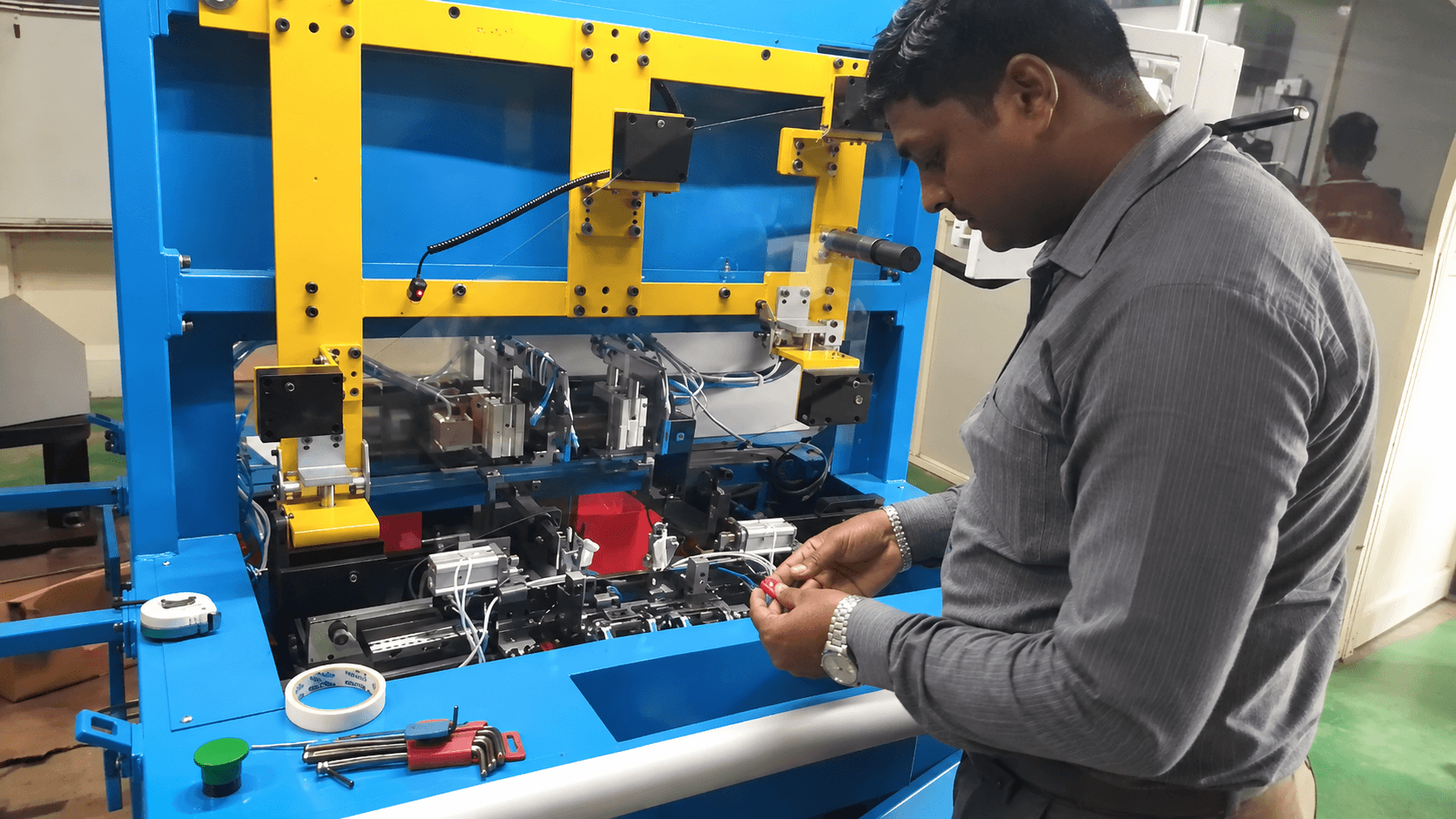 Dhruvansh engineer working on an industrial automation machine